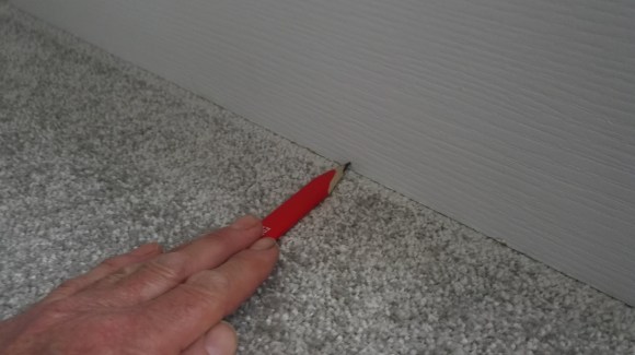 Marking door along carpet